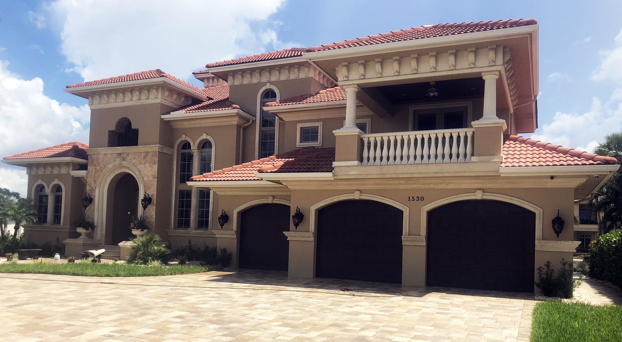 Residential exterior house painting with a Naples Painting Company