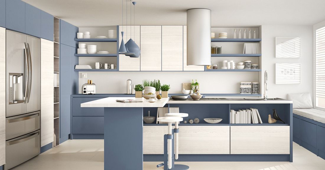 clean, modern renovated kitchen with deep blue cabinets