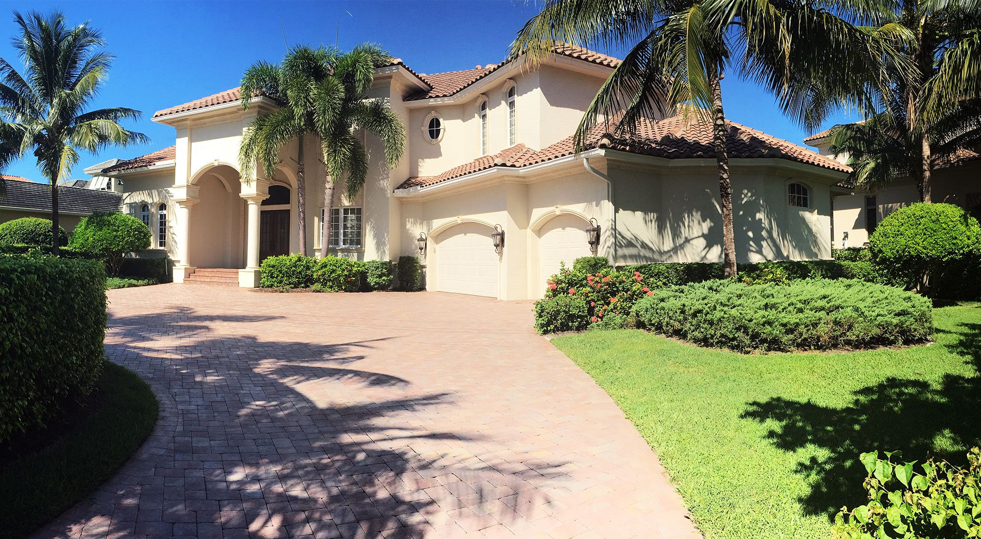 Luxury house exterior painting in the Naples Fl area