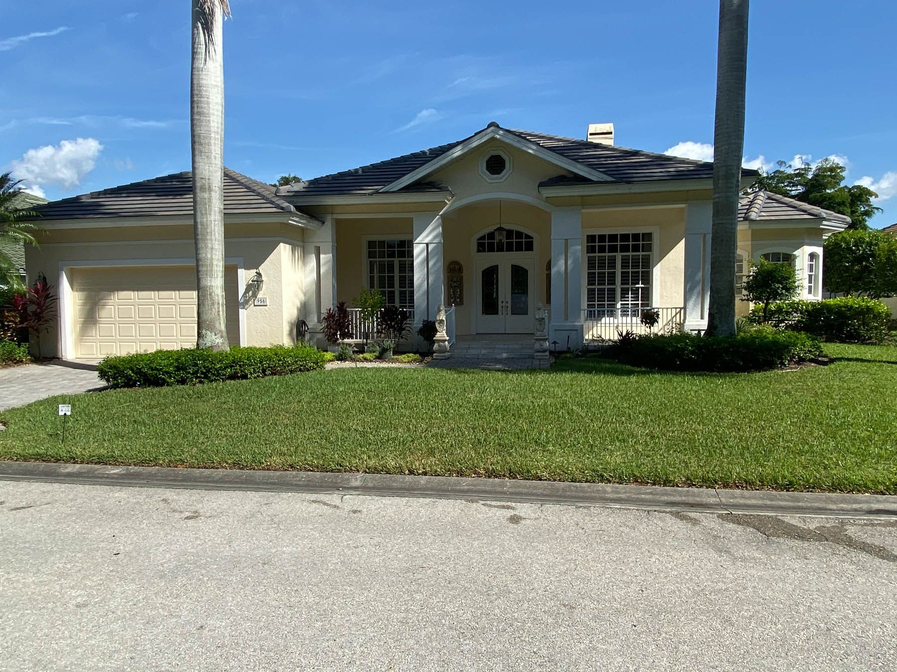 Exterior residential painting on home in Naples FL
